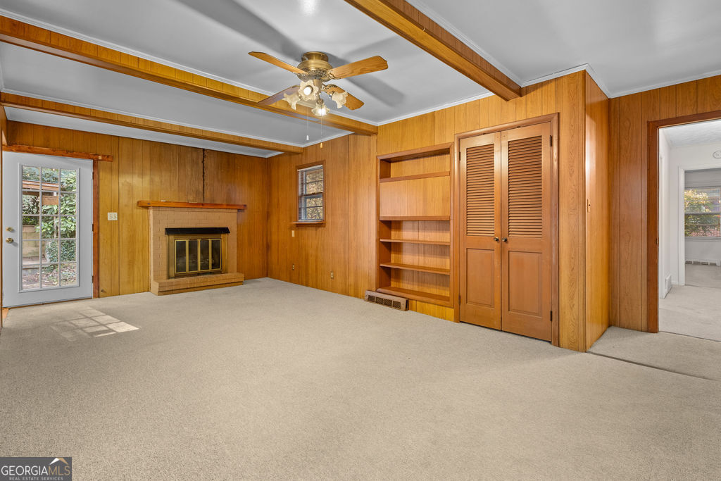 130 Club Drive Stockbridge, GA 30281 - Photo 13 of 28 a view of an empty room with a fireplace and a window