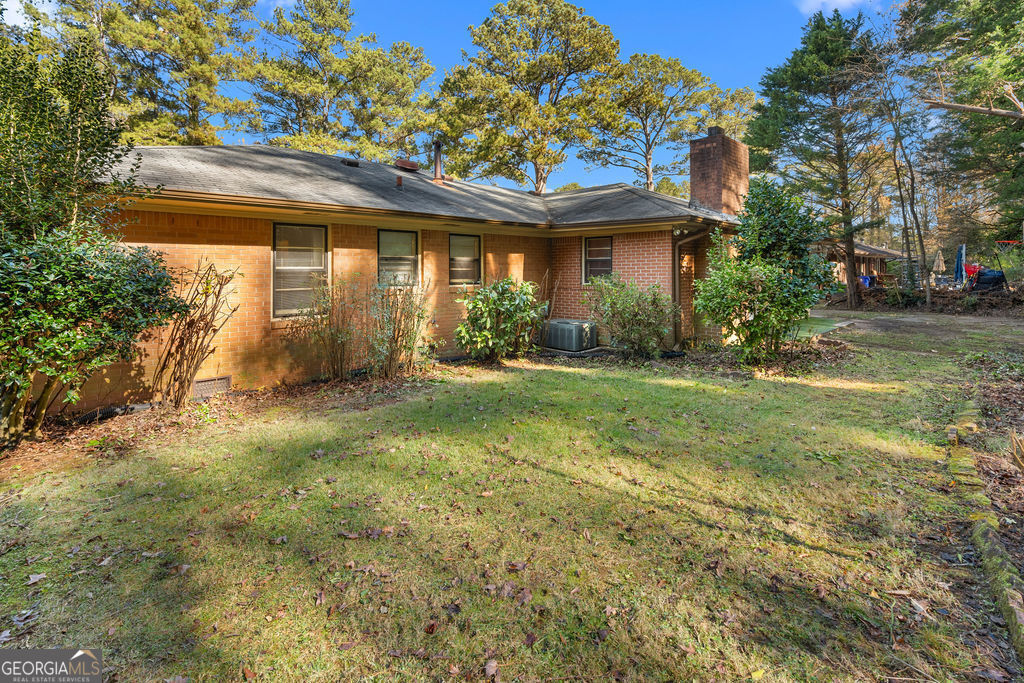130 Club Drive Stockbridge, GA 30281 - Photo 25 of 28 a view of a house with yard and sitting area