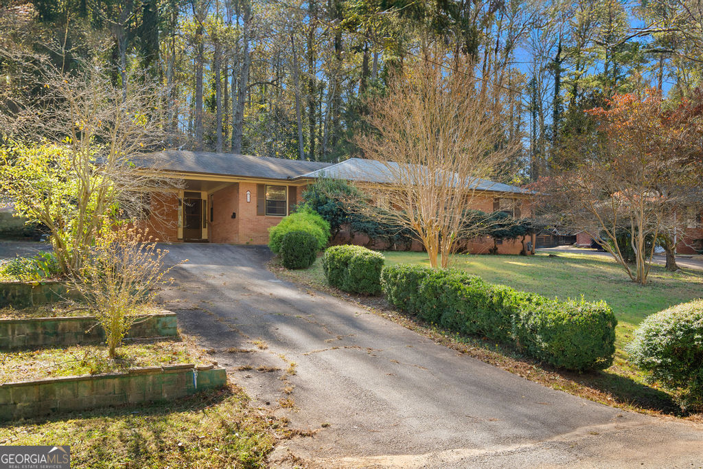 130 Club Drive Stockbridge, GA 30281 - Photo 28 of 28 a front view of a house with a garden