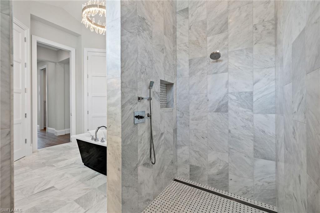 2649 Tarpon Road Naples, FL 34102 - Photo 24 of 50 a bathroom with a shower
