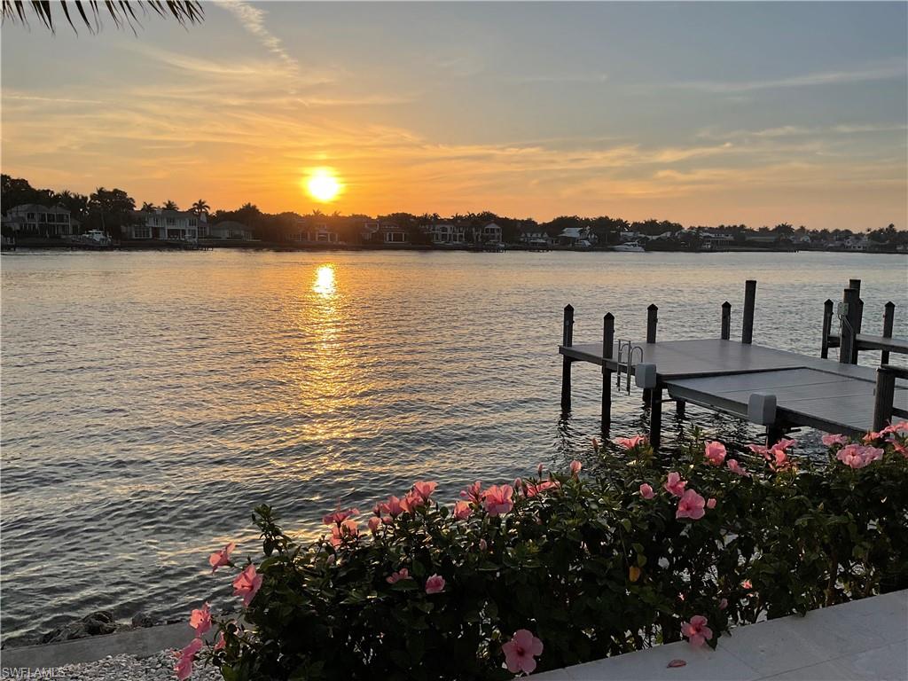 2649 Tarpon Road Naples, FL 34102 - Photo 50 of 50 a view of a lake with a garden