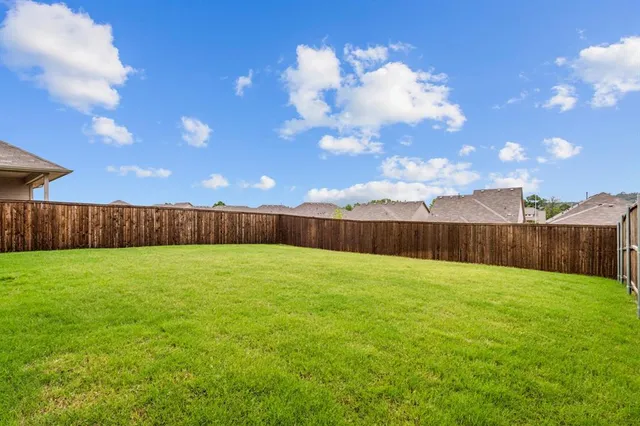 a view of an outdoor space and a yard