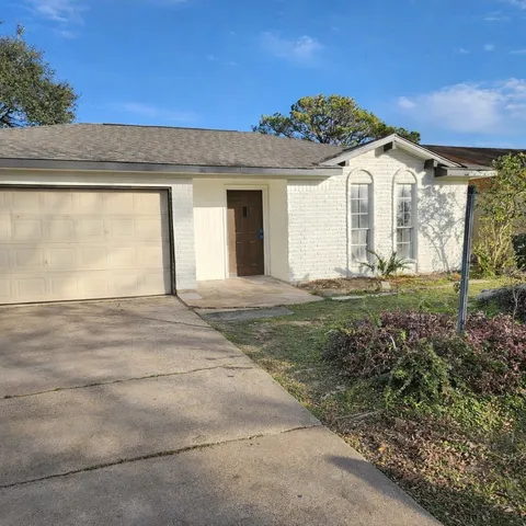 a view of a house with a garden