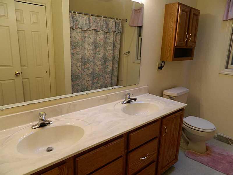 193 Rochester Road Freedom, PA 15042 - Photo 22 of 24 Other. Main bathroom with very nice double bowl sinks. You can see the reflection of the shower and closet in the mirror.