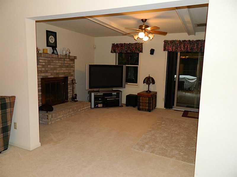 193 Rochester Road Freedom, PA 15042 - Photo 9 of 24 Family Room. Living room with open doorway side by side to the family room.