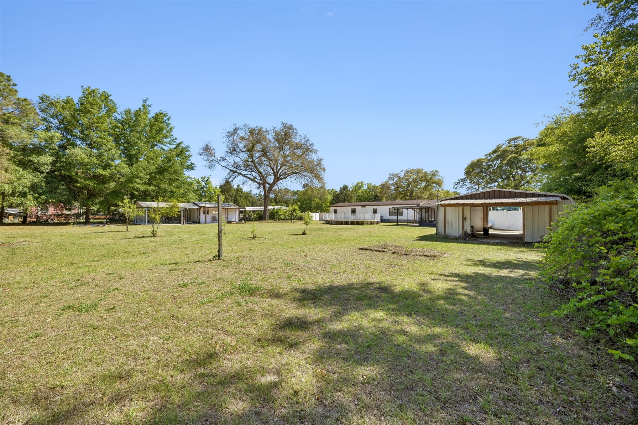 85256 Stephen Road Yulee, FL 32097 - Photo 15 of 48 a view of a house with a yard