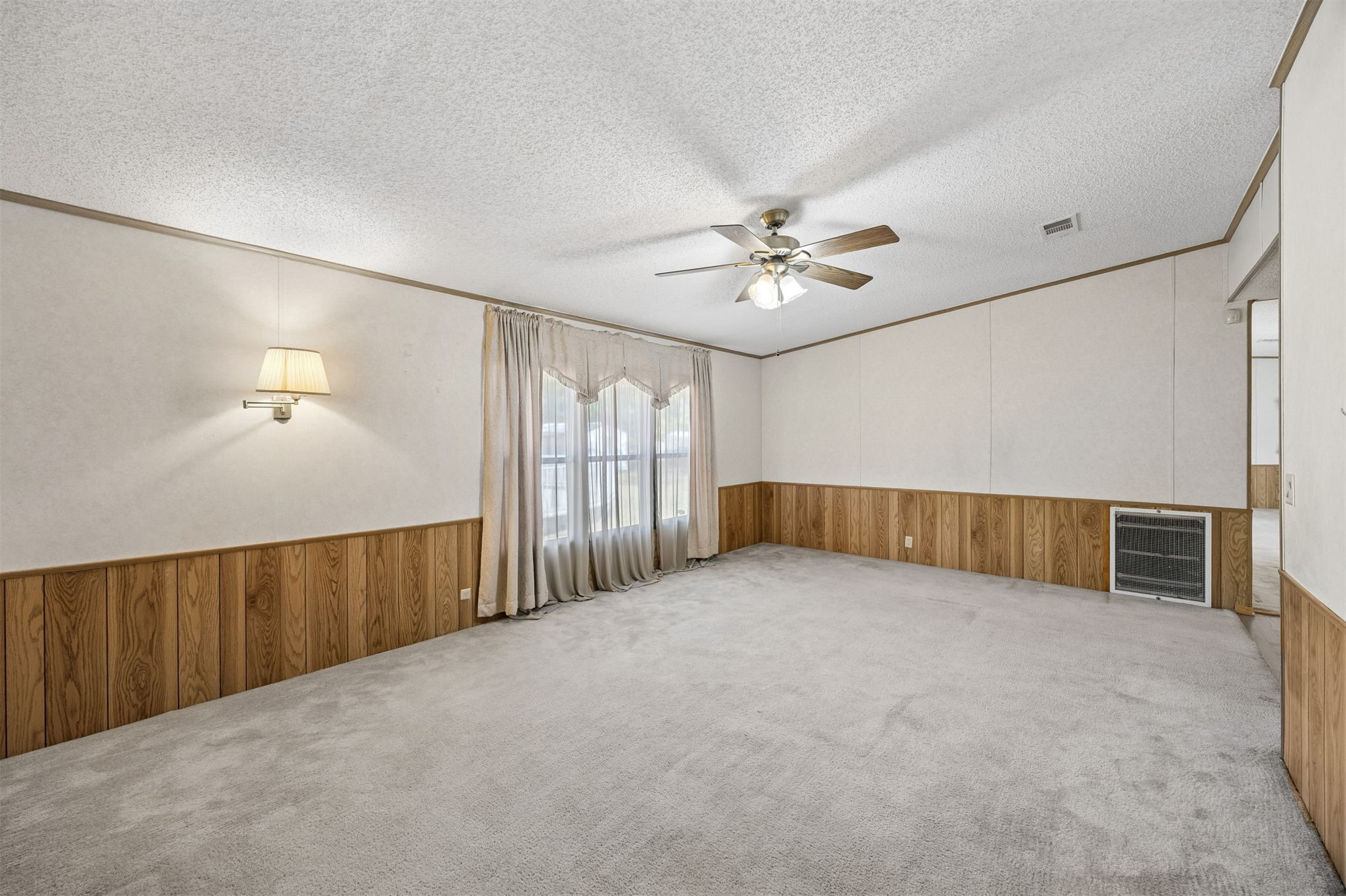85256 Stephen Road Yulee, FL 32097 - Photo 18 of 48 an empty room with windows