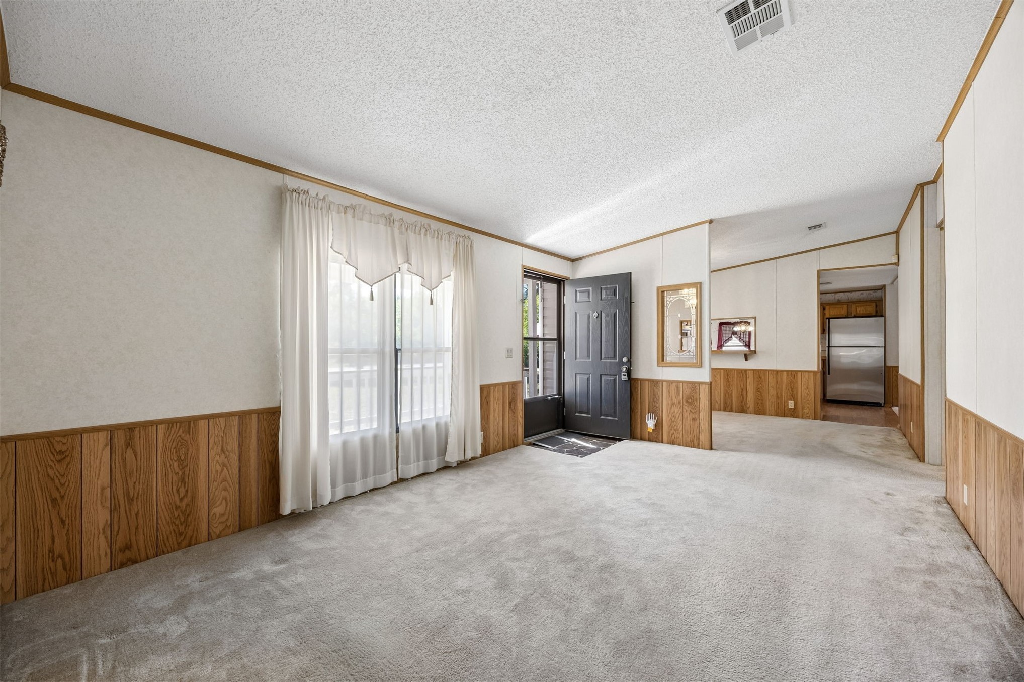 85256 Stephen Road Yulee, FL 32097 - Photo 19 of 48 a view of an empty room with a window