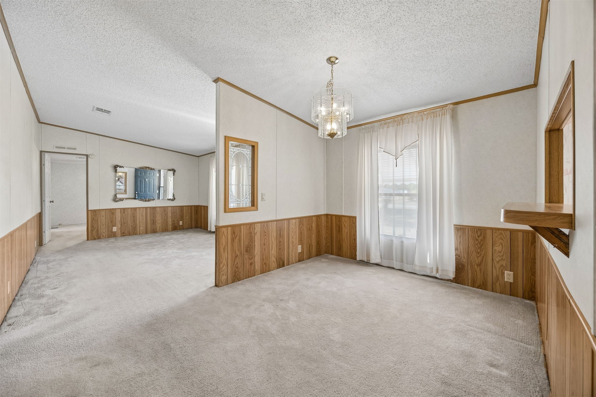 85256 Stephen Road Yulee, FL 32097 - Photo 20 of 48 a view of an empty room with a window