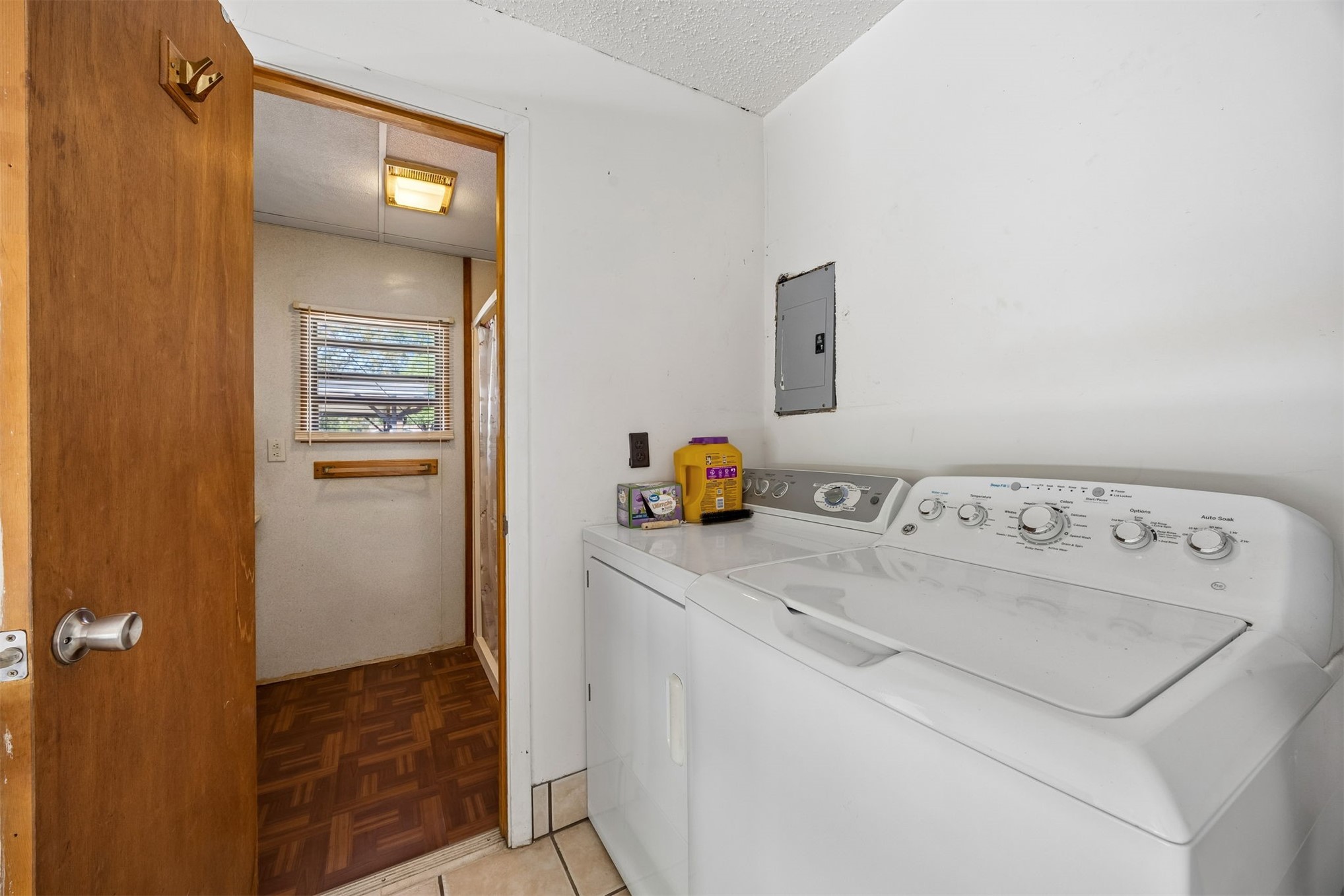 85256 Stephen Road Yulee, FL 32097 - Photo 22 of 48 a utility room with dryer and washer