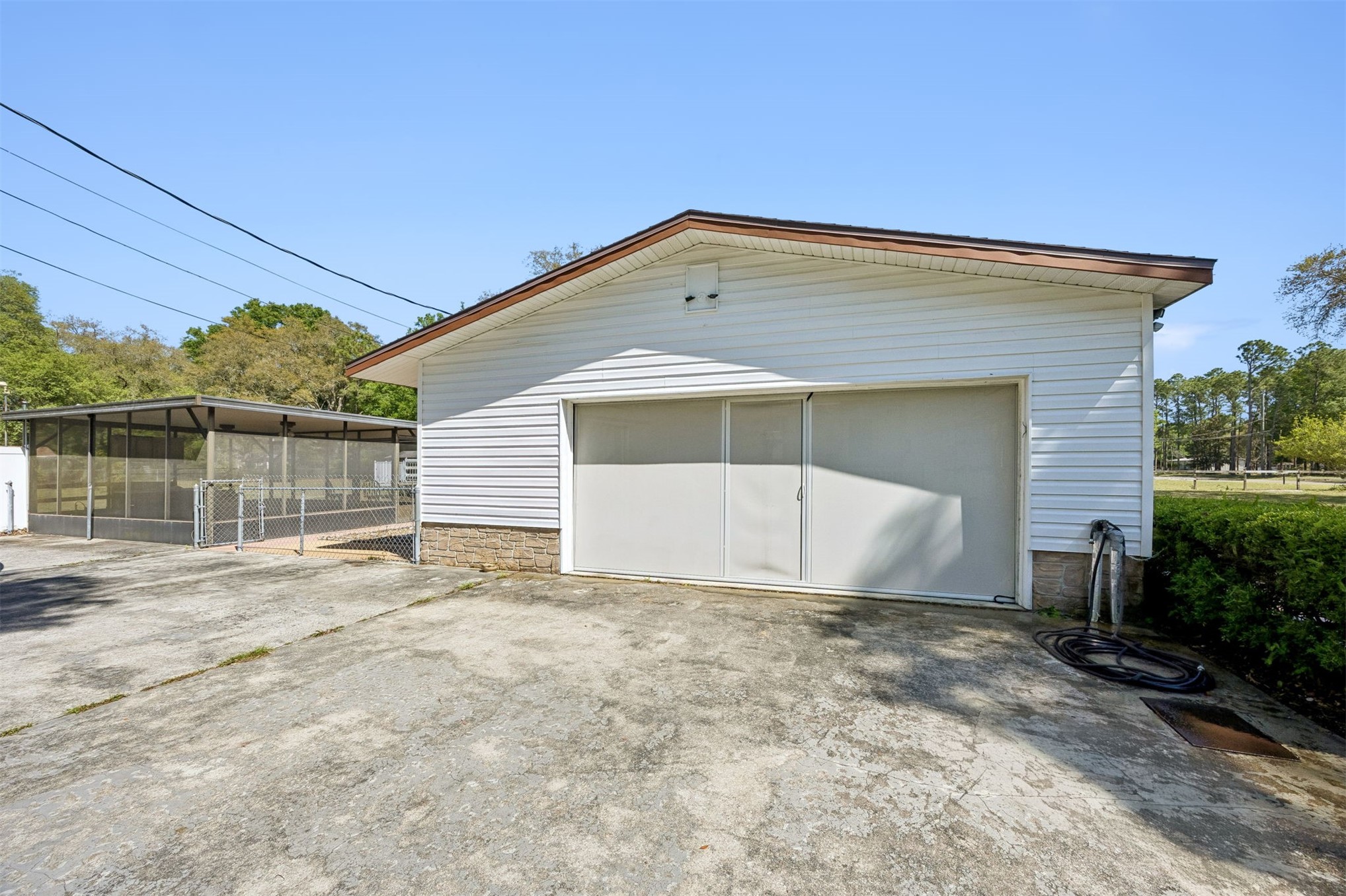 85256 Stephen Road Yulee, FL 32097 - Photo 23 of 48 a front view of a house with a yard