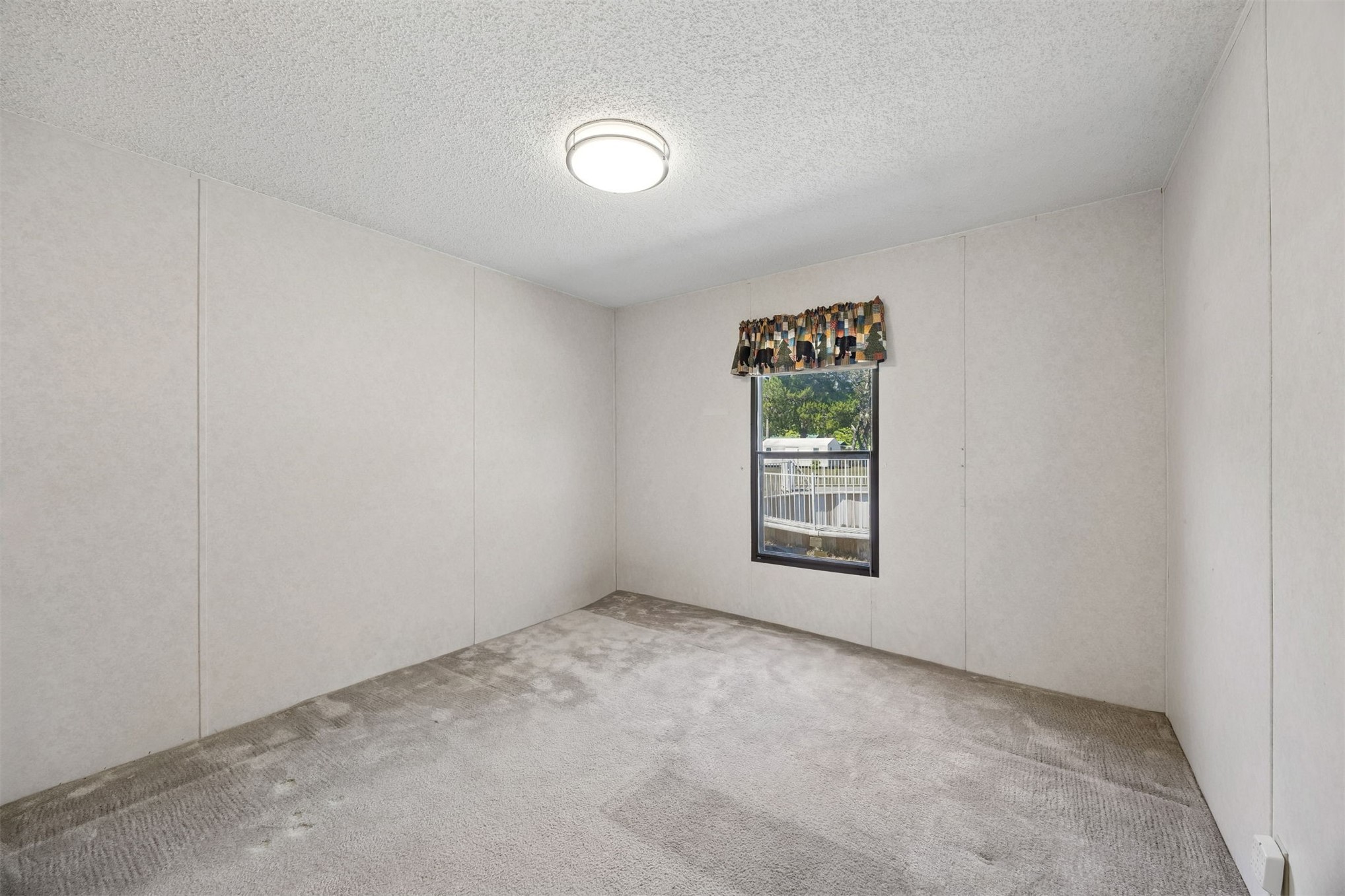 85256 Stephen Road Yulee, FL 32097 - Photo 36 of 48 an empty room with windows