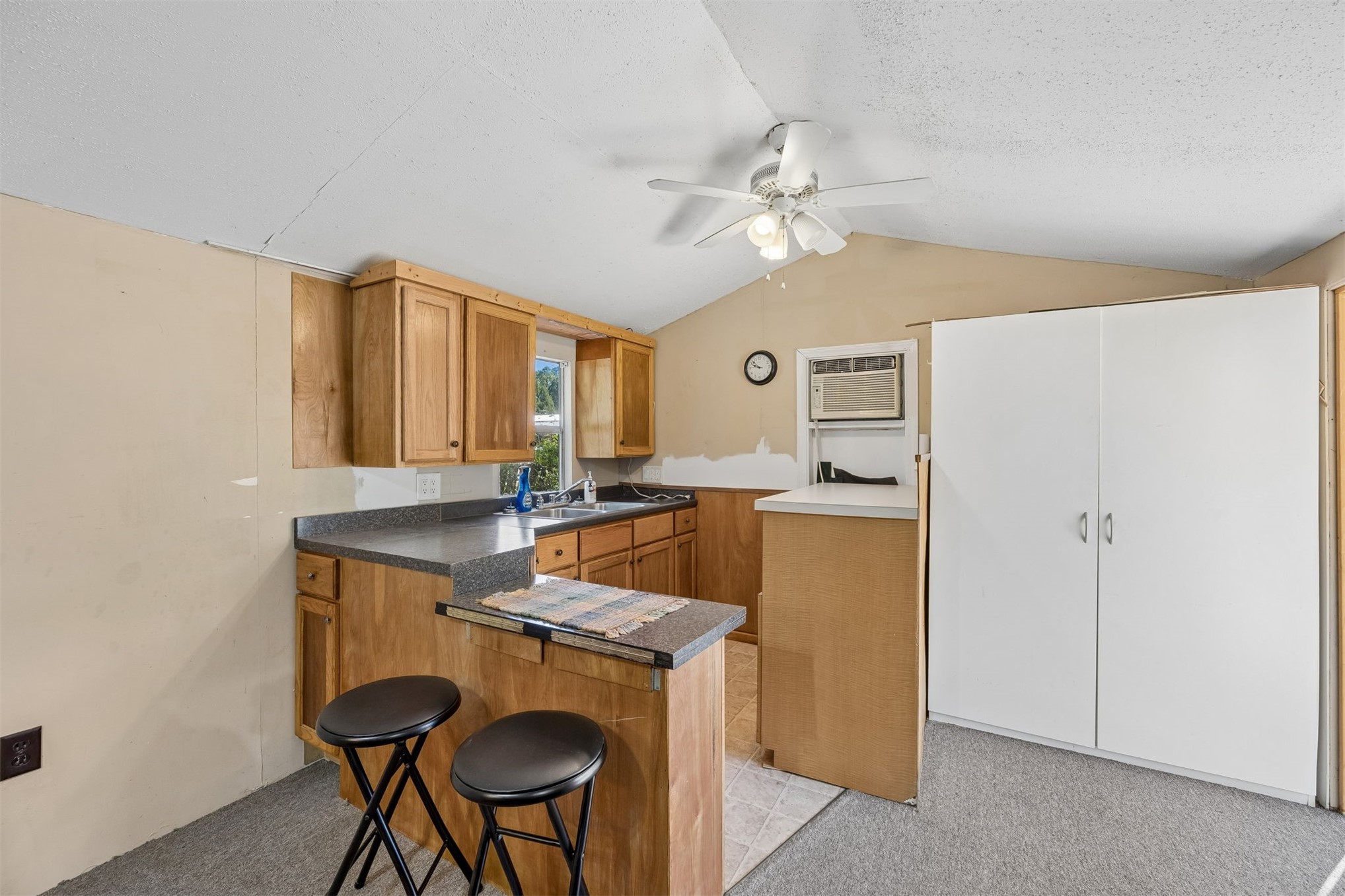 85256 Stephen Road Yulee, FL 32097 - Photo 39 of 48 a view of a kitchen with a sink cabinets and wooden floor