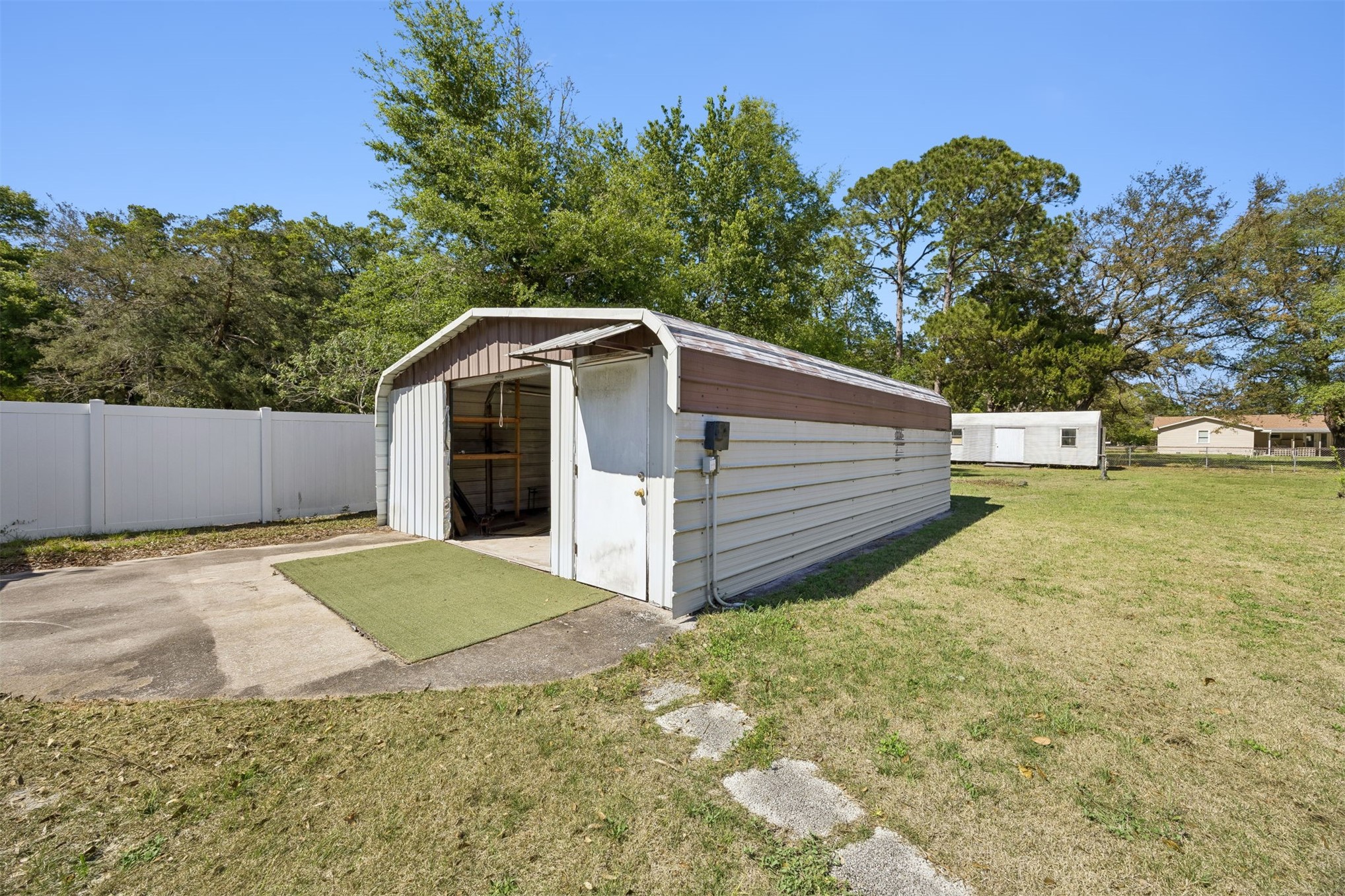 85256 Stephen Road Yulee, FL 32097 - Photo 10 of 48 a view of a house with a yard
