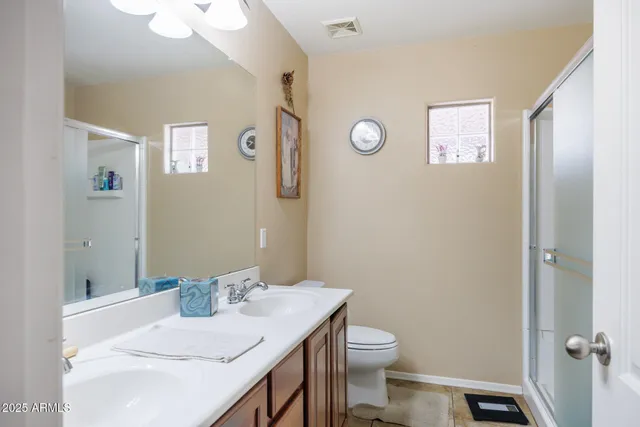 a bed room with a bed and a window