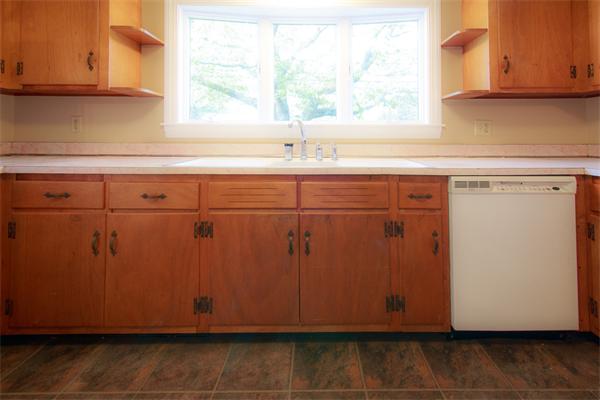 1347 Bay Road Sharon, MA 02067 - Photo 15 of 19 a view of a kitchen with a sink and cabinets