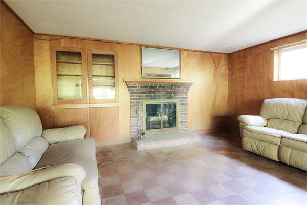 1347 Bay Road Sharon, MA 02067 - Photo 16 of 19 a living room with furniture and a fireplace