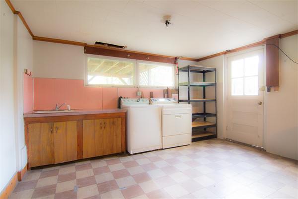 1347 Bay Road Sharon, MA 02067 - Photo 17 of 19 a view of kitchen with cabinets and window