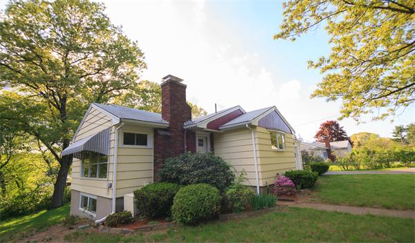 1347 Bay Road Sharon, MA 02067 - Photo 3 of 19 a front view of a house with a garden