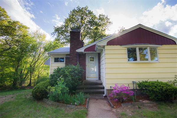 1347 Bay Road Sharon, MA 02067 - Photo 4 of 19 a front view of a house with a garden