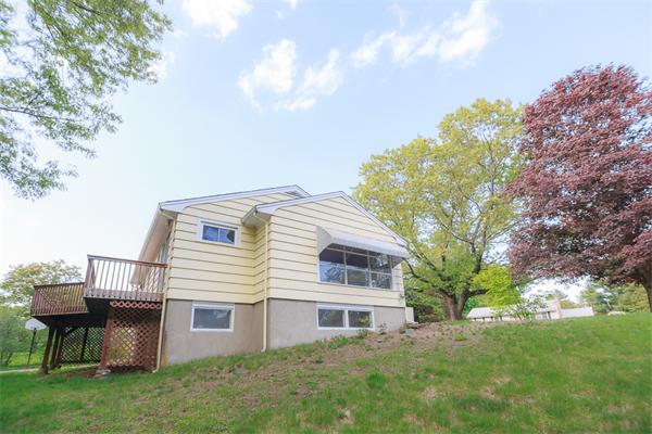 1347 Bay Road Sharon, MA 02067 - Photo 8 of 19 a view of a house with a backyard
