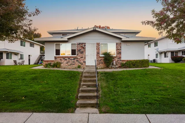 a front view of house with yard