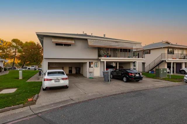 a view of car parked in front of house