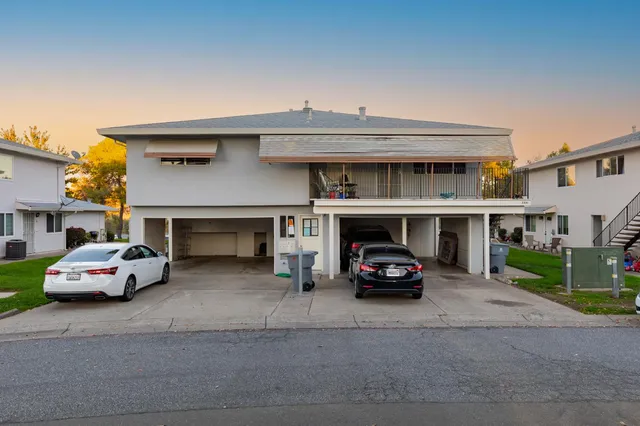 a car parked in front of a house