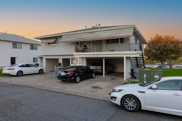 a car parked in front of a house