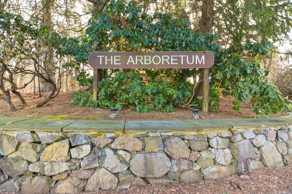a view of sign board with yard