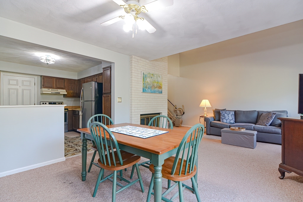 23 Tamarack Lane, Unit 23 Peabody, MA 01960 - Photo 12 of 42 a view of a dining room with furniture