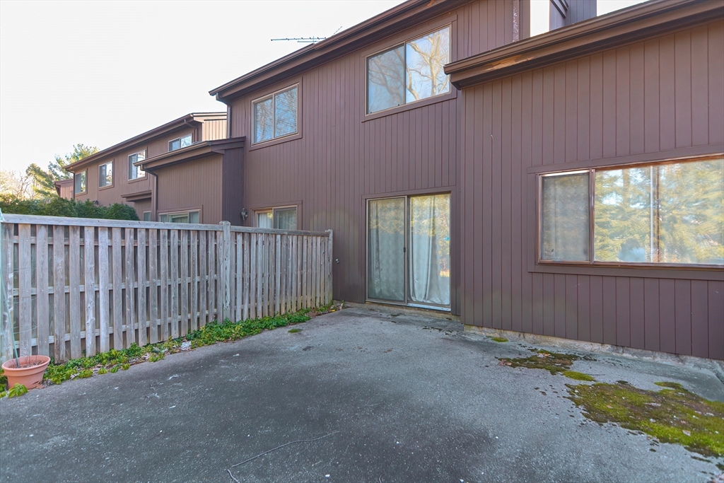 23 Tamarack Lane, Unit 23 Peabody, MA 01960 - Photo 30 of 42 a view of a house with backyard and porch