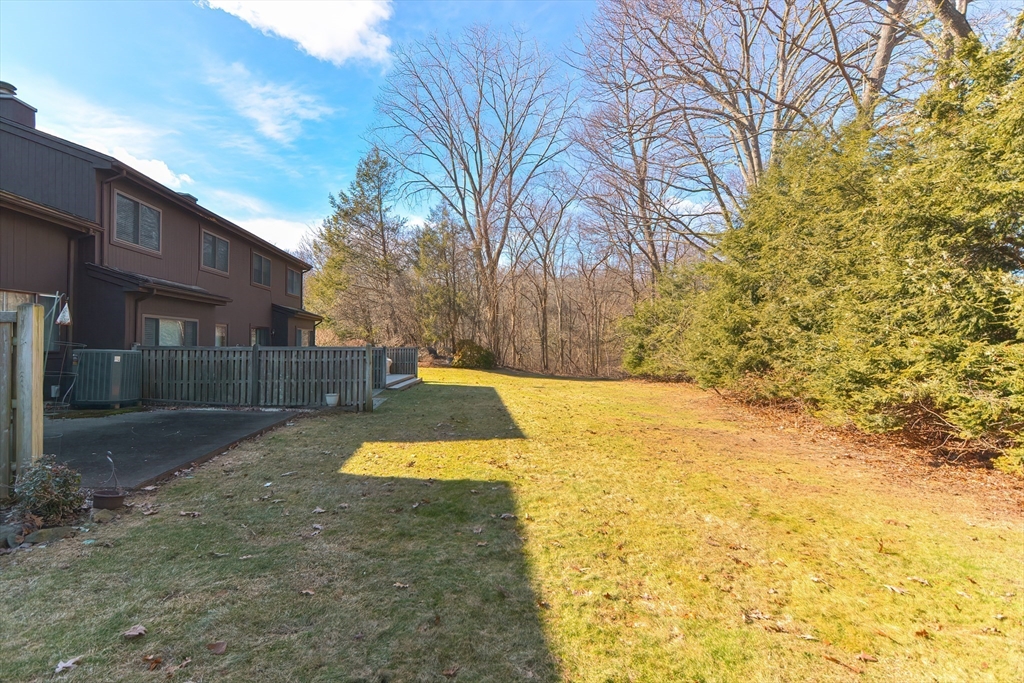 23 Tamarack Lane, Unit 23 Peabody, MA 01960 - Photo 33 of 42 a view of yard with swimming pool