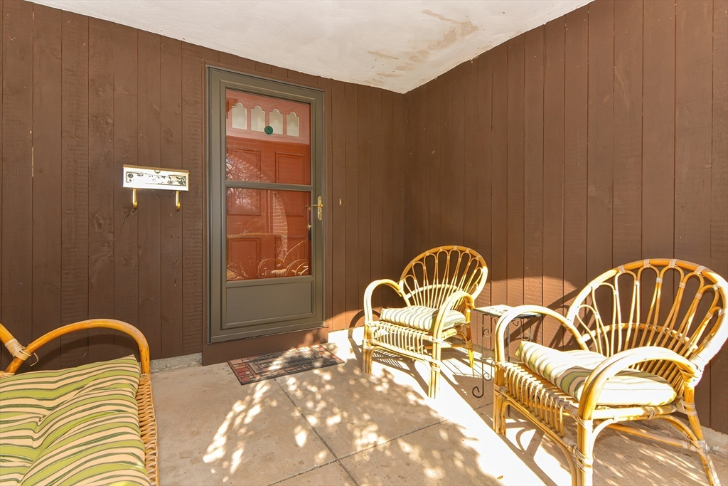 23 Tamarack Lane, Unit 23 Peabody, MA 01960 - Photo 4 of 42 a view of a balcony with chairs