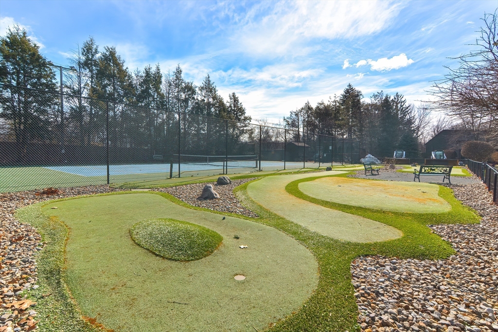 23 Tamarack Lane, Unit 23 Peabody, MA 01960 - Photo 41 of 42 a view of a swimming pool with a yard