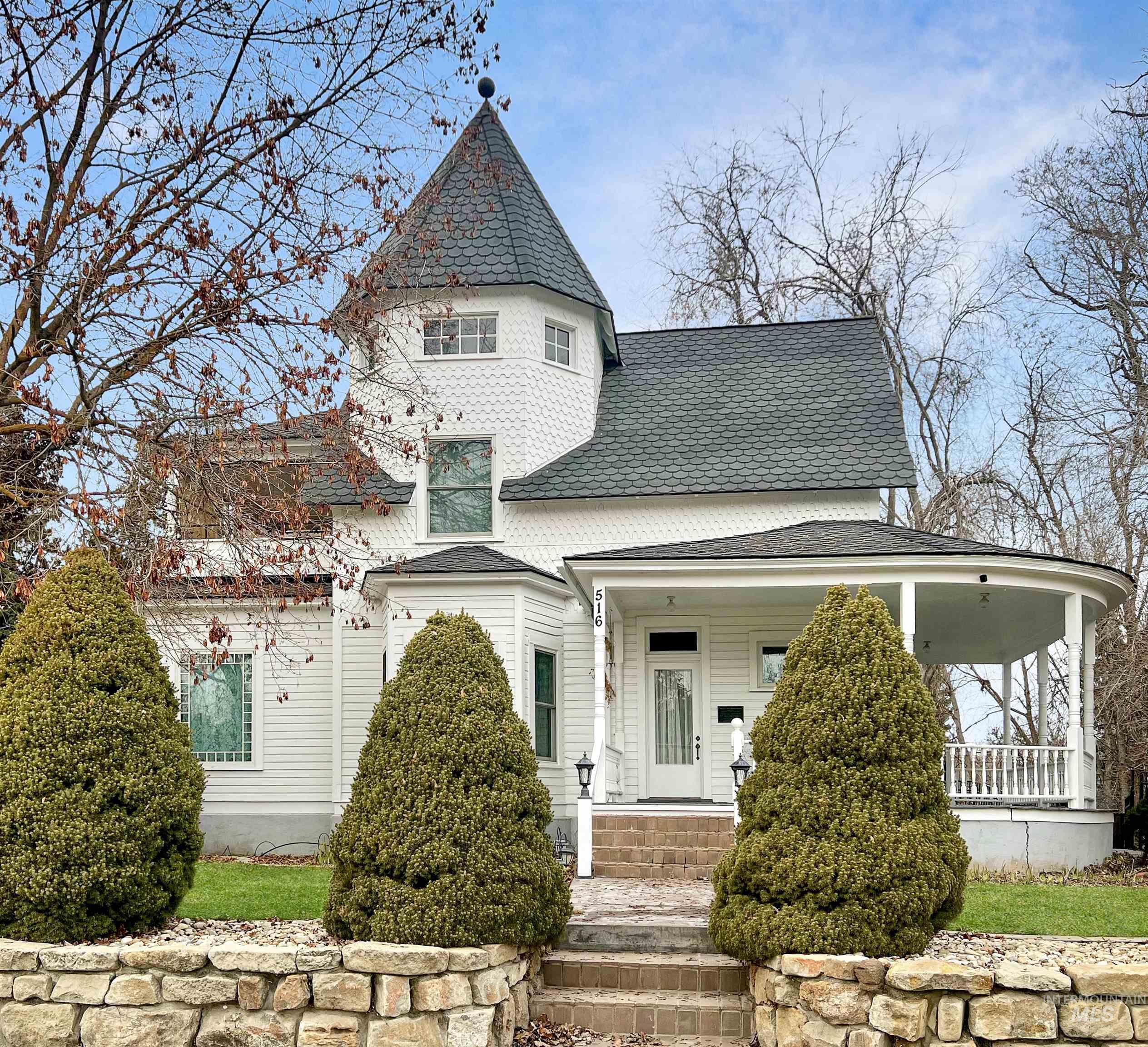 516 East Main Street Weiser, ID 83672 - Photo 2 of 50 Victorian-style house with covered porch and roof with shingles