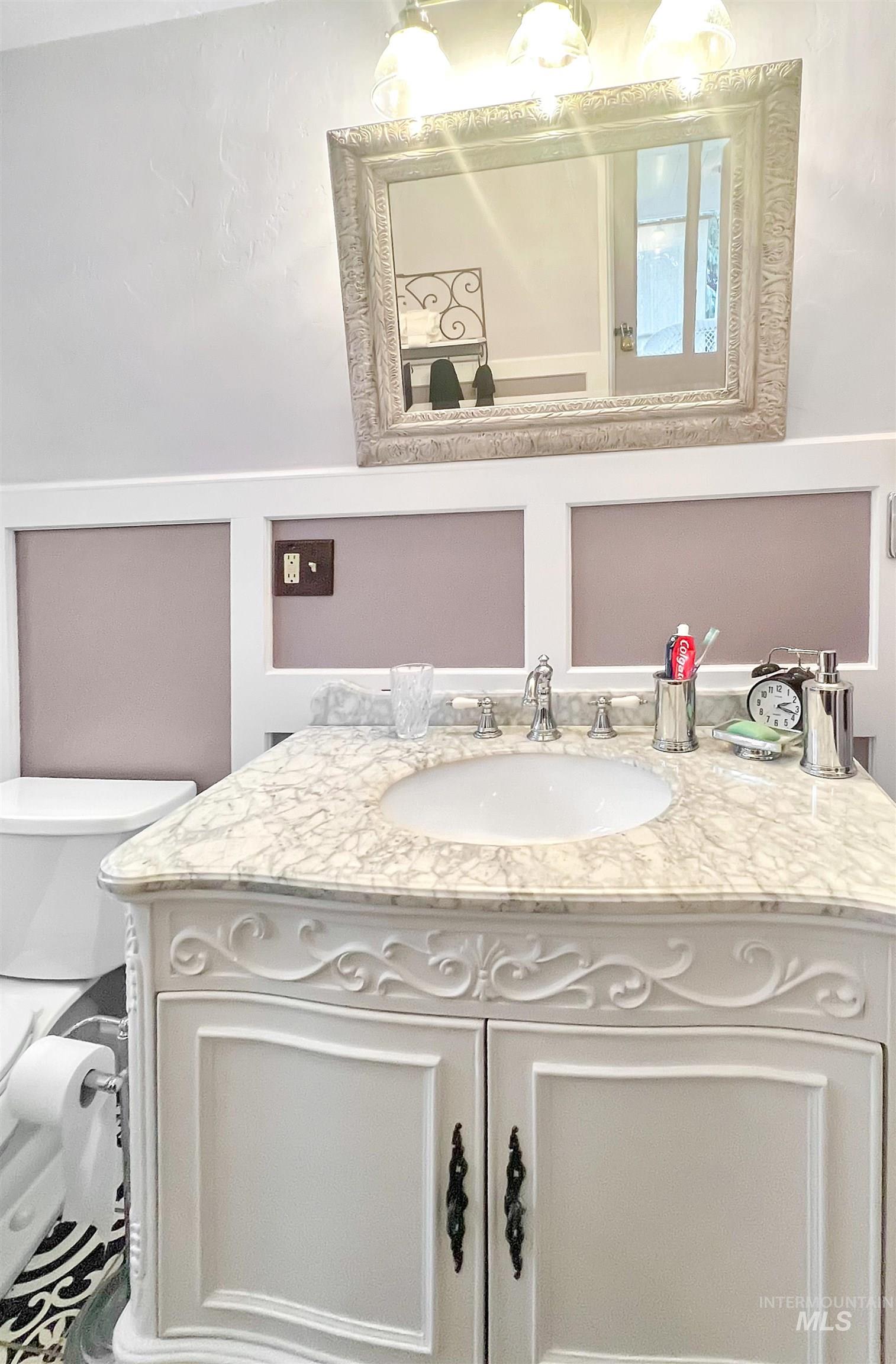 516 East Main Street Weiser, ID 83672 - Photo 34 of 50 Bathroom featuring toilet and vanity