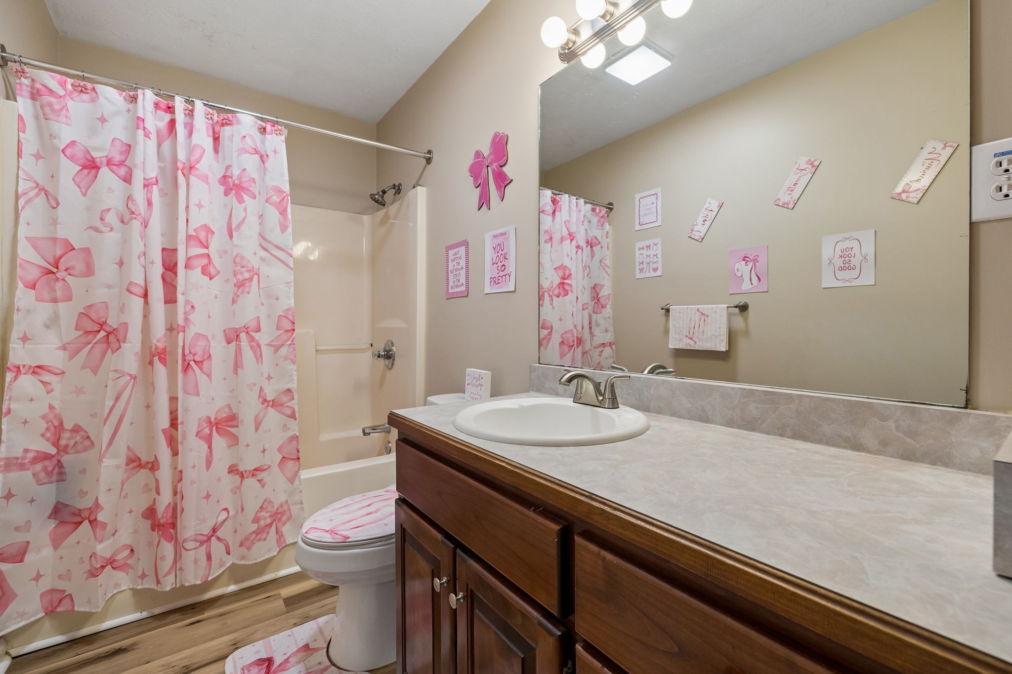 2075 Nikki Drive Springfield, TN 37172 - Photo 25 of 58 a bathroom with a sink a vanity and a mirror