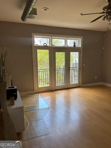 a view of an empty room with a window