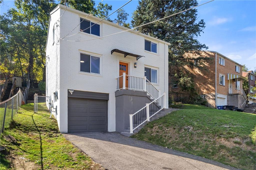 8144 Lincoln Road Verona, PA 15147 - Photo 2 of 33 a front view of a house with garden