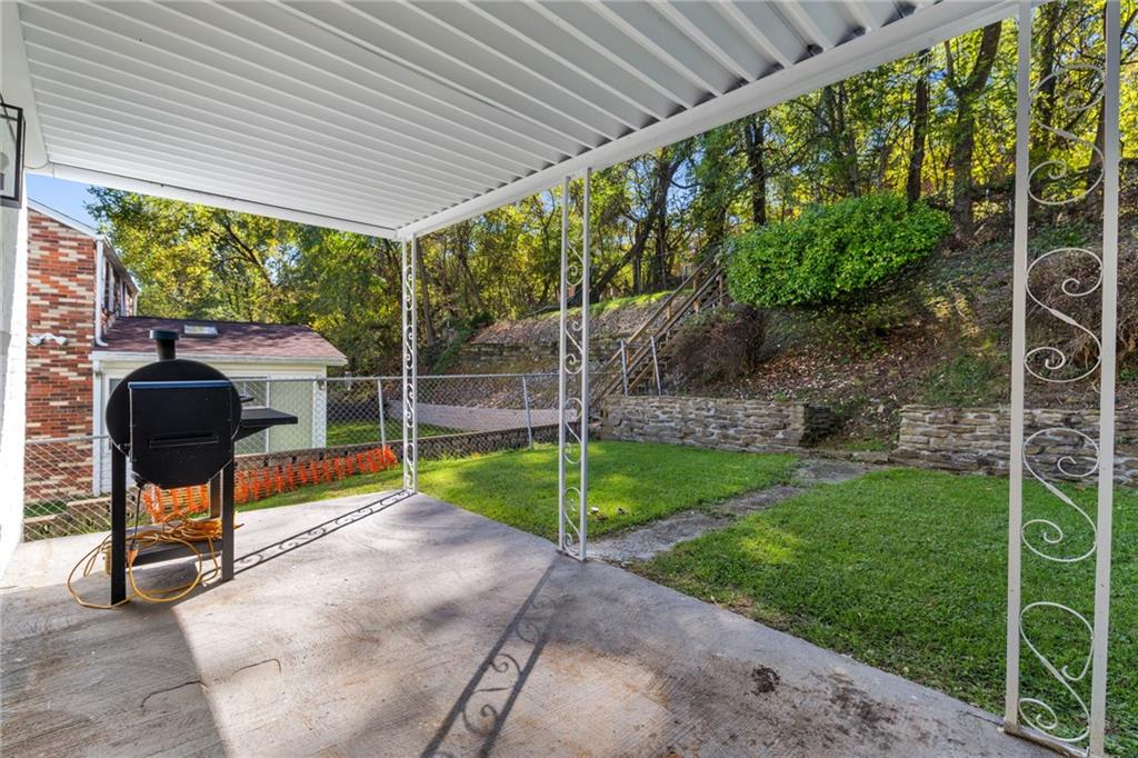 8144 Lincoln Road Verona, PA 15147 - Photo 27 of 33 a view of a porch with furniture and a yard
