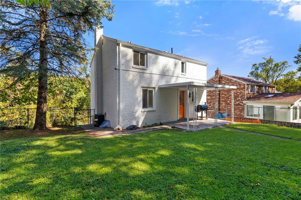8144 Lincoln Road Verona, PA 15147 - Photo 30 of 33 a view of a house with a yard and sitting area