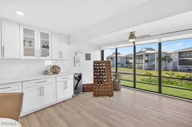 a bedroom with furniture and window