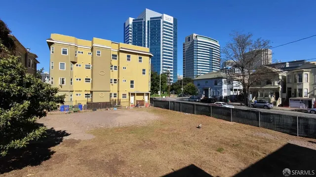 a swimming pool with outdoor seating and yard