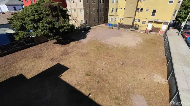 a view of balcony with wooden floor