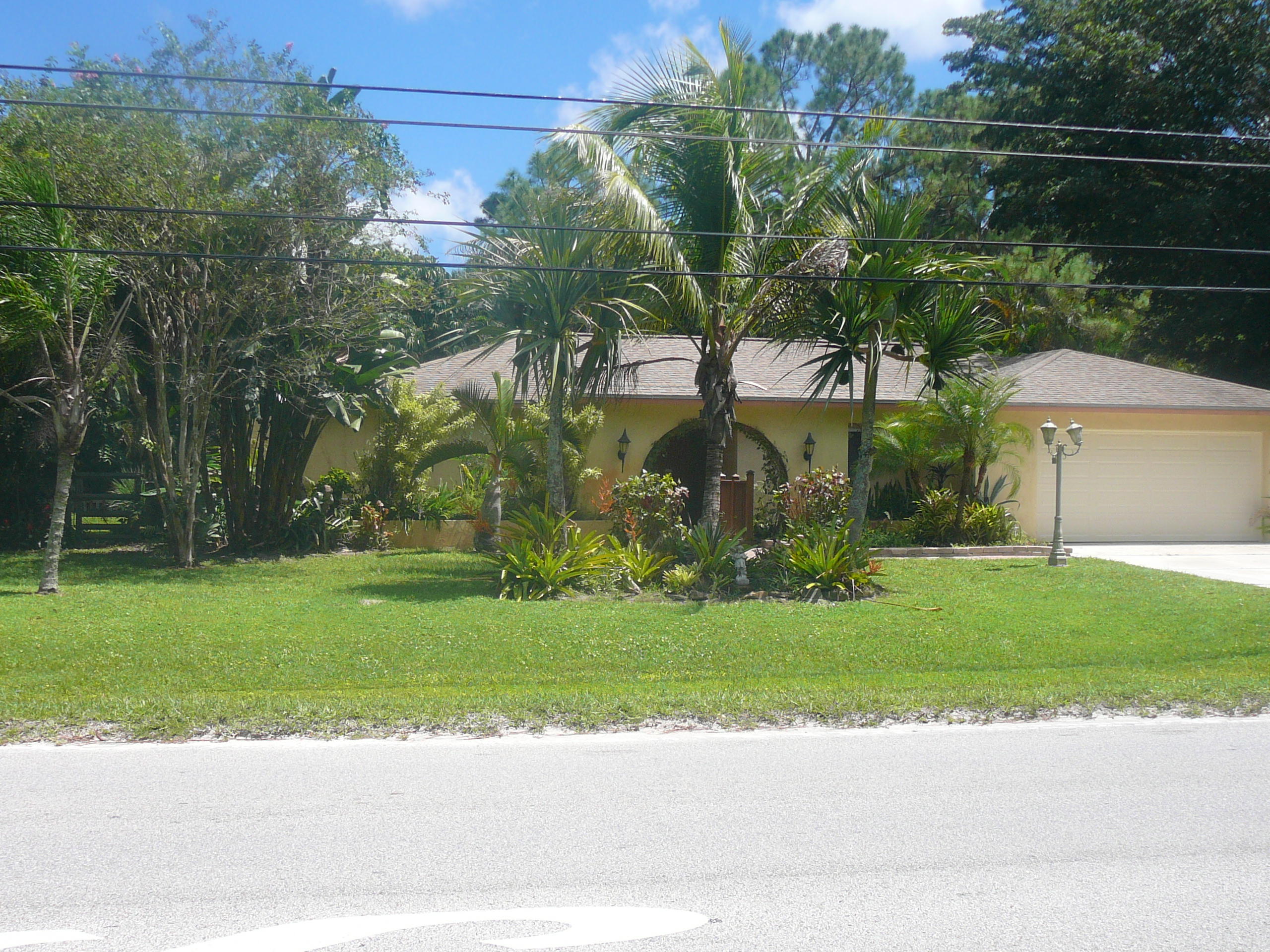 17592 Alexander Run Jupiter, FL 33478 - Photo 3 of 20 Front Yard