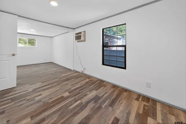 an empty room with windows