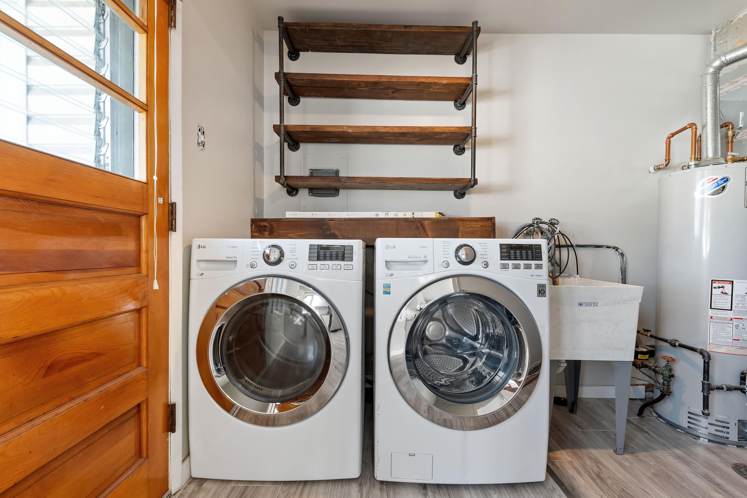 8143 Grace Street Highland, IN 46322 - Photo 12 of 18 a utility room with dryer and washer