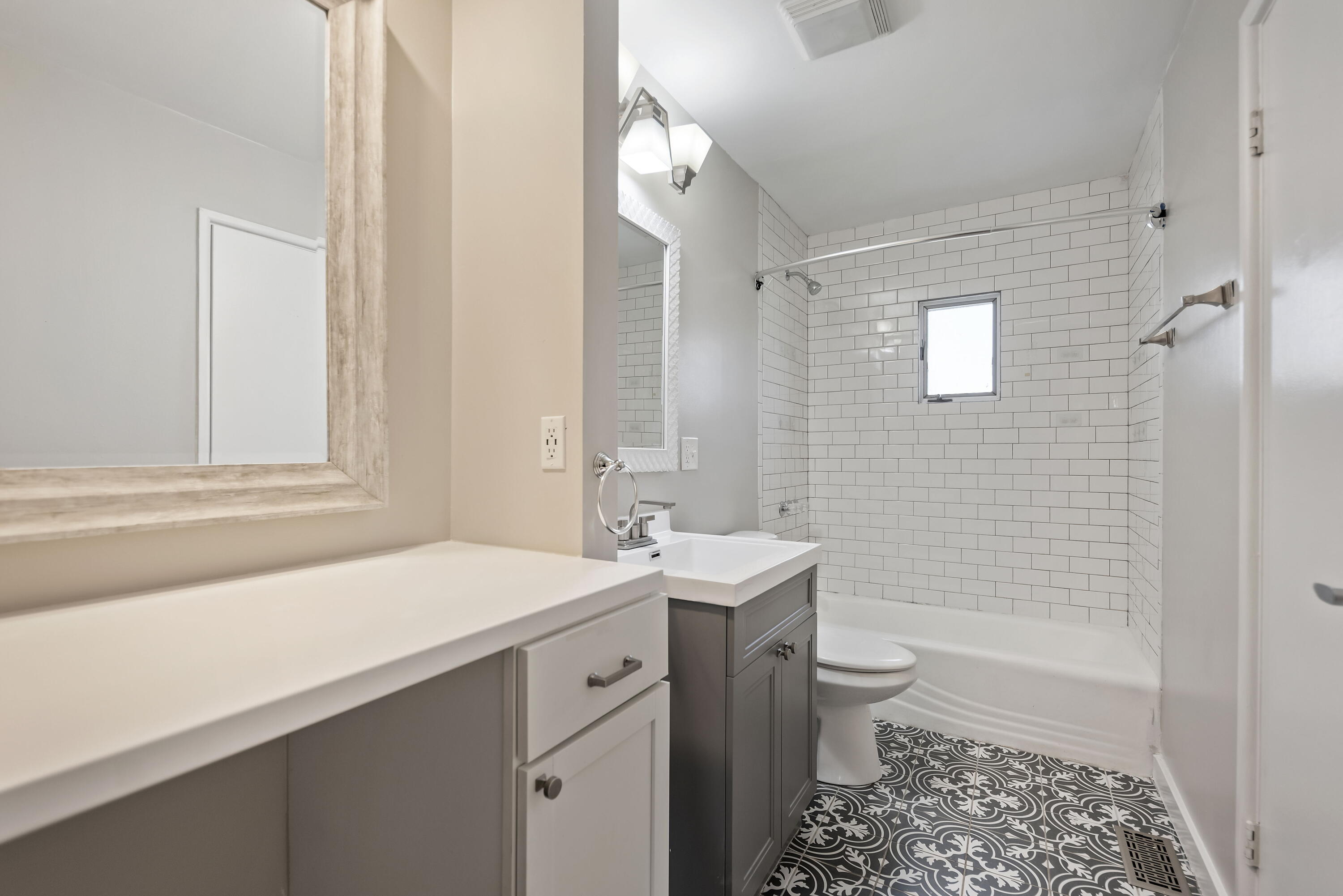 8143 Grace Street Highland, IN 46322 - Photo 16 of 18 a bathroom with a sink a toilet and shower