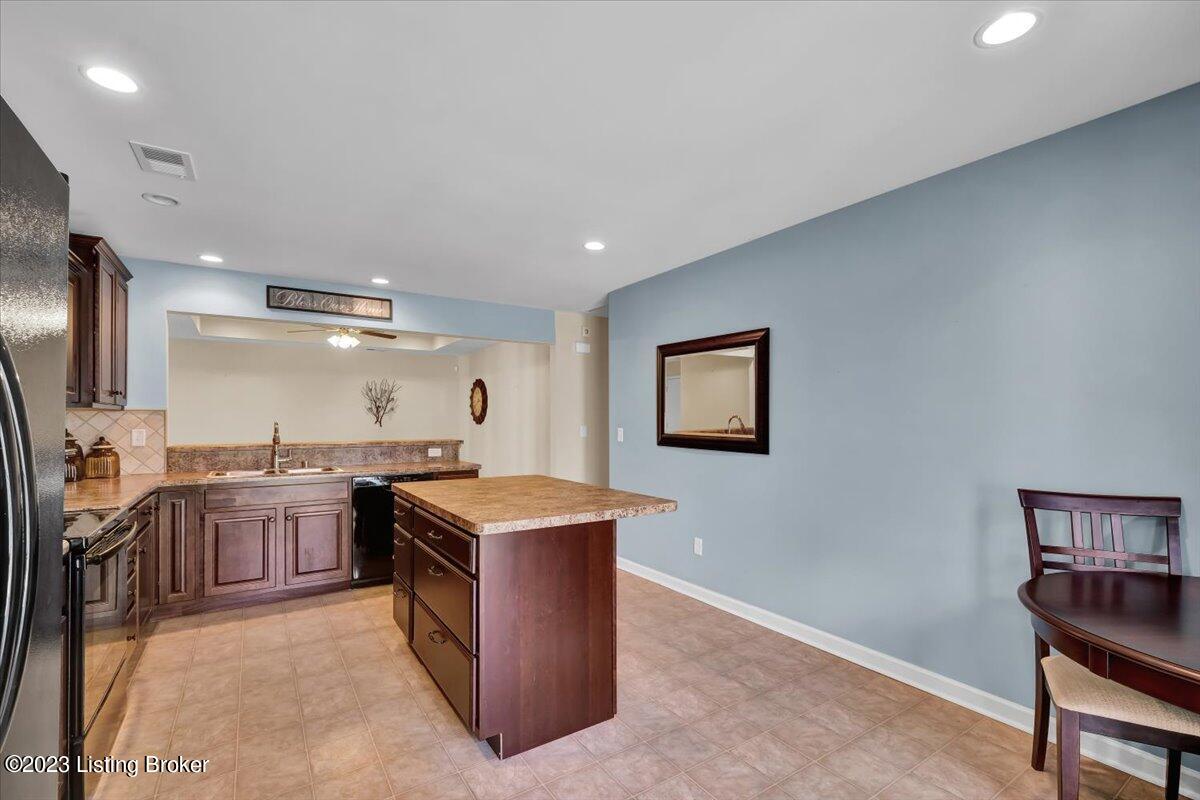 6458 Renate Road Louisville, KY 40291 - Photo 9 of 32 Nice island for extra storage and serving a meal!
